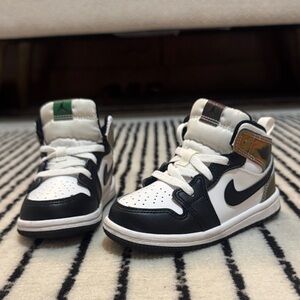 Nike Jordan Kids Black and White Sneakers with Gold Accents